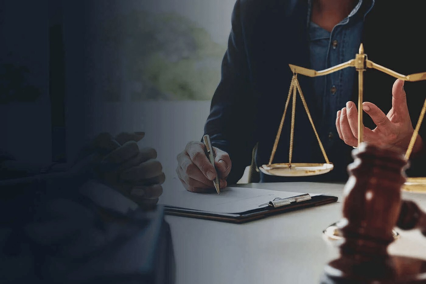 woman lawyer writing with a pen